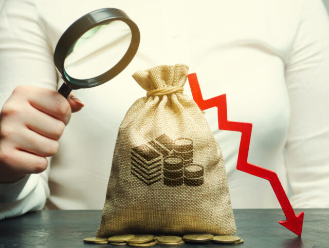 Business woman analyzes the budget. Bad business. Loss of investment and capital flight. Financial instability and Unprofitability representing bad fiancial advice