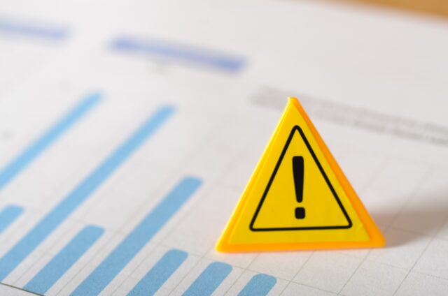 Data Warning: Caution Sign Over a Report.
