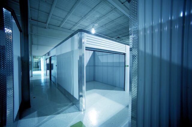Empty storage warehouse symbolising Store First Ltd pension losses and storage pods mis-sold investment.