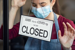 Closed shop symbolising COVID business interruption insurance claim.