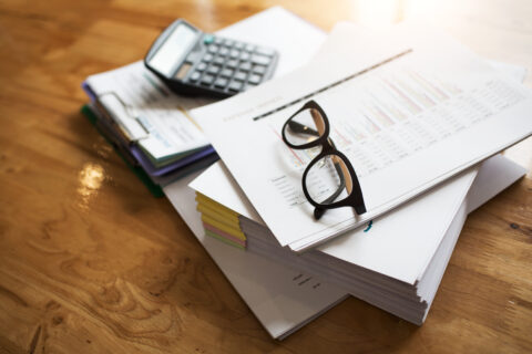 Documents and calculator at desk symbolising legal deadlines