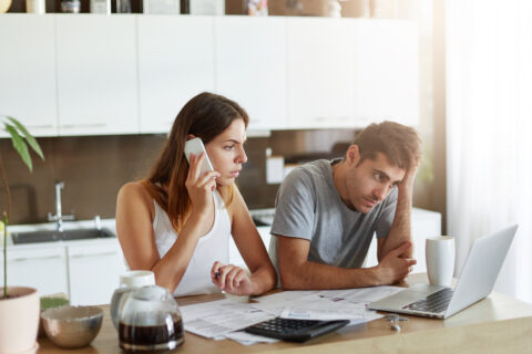 Victims of crypto scam contacting their bank to report fraudulent transfers.