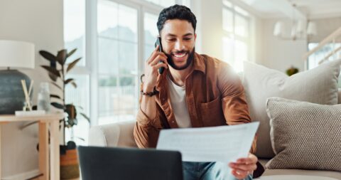 Client receiving confirmation of compensation after a successful high-risk investment claim.
