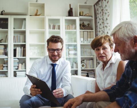 Solicitor explaining the high-risk investment claims process to a client on a no-win no-fee basis.