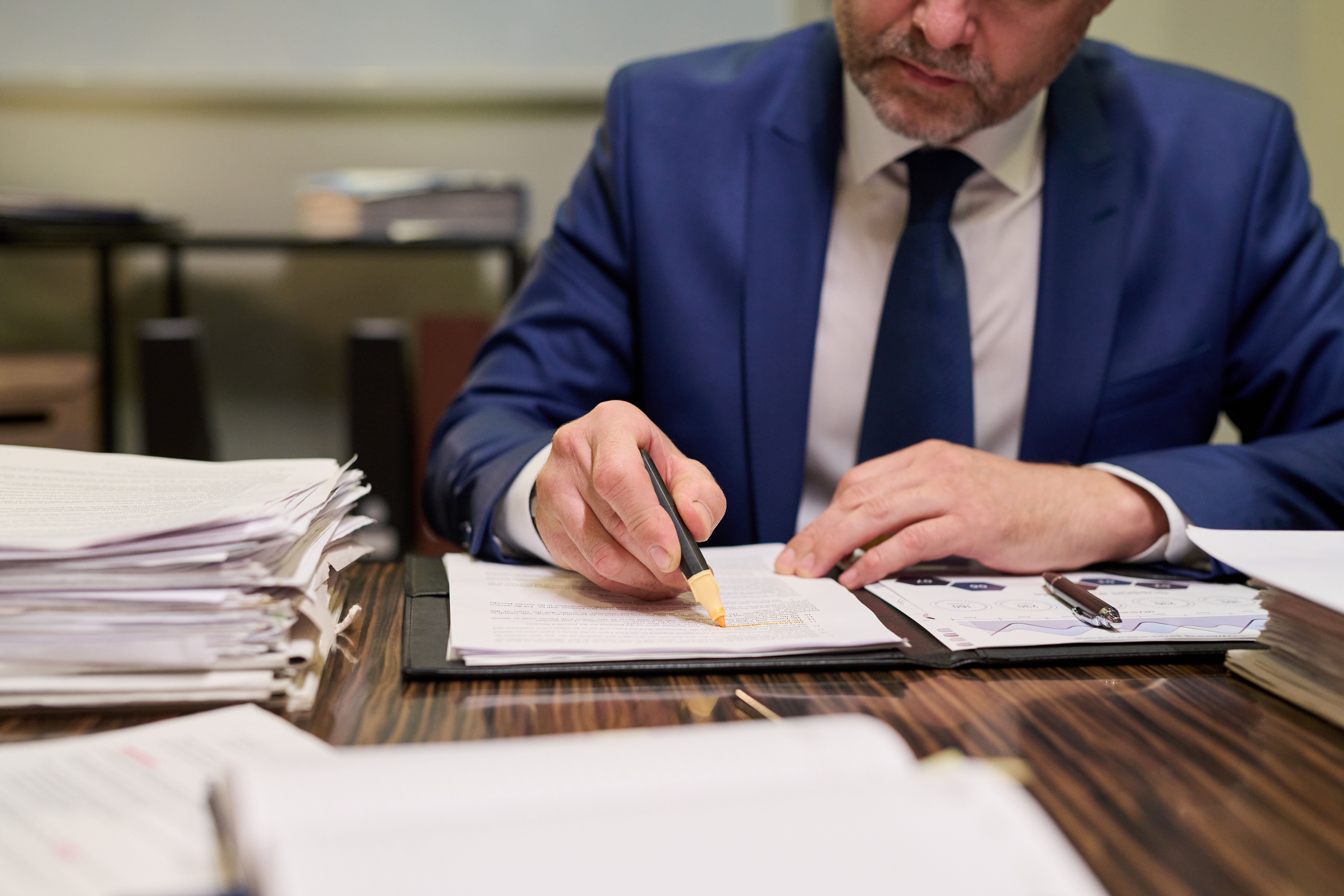 Financial professional reviewing pension advice documents