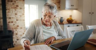 Woman researching pension information online