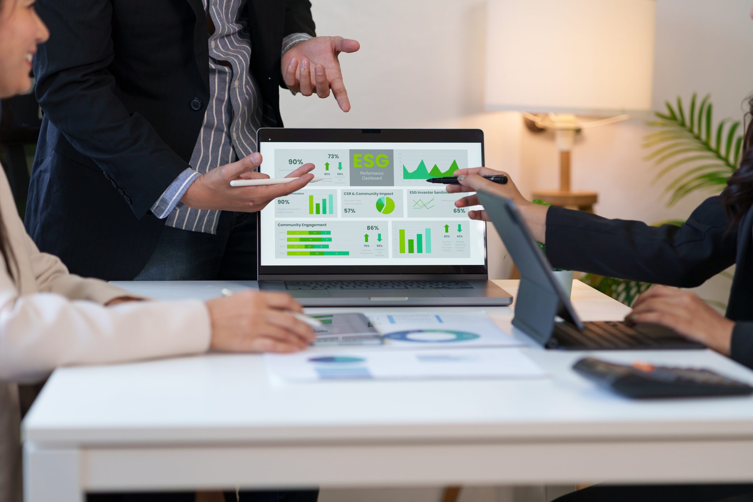 Financial investment charts being reviewed on a laptop